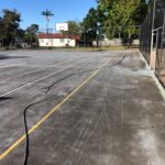 Tennis Court Before — Pressure Cleaner Operators in Mackay, QLD